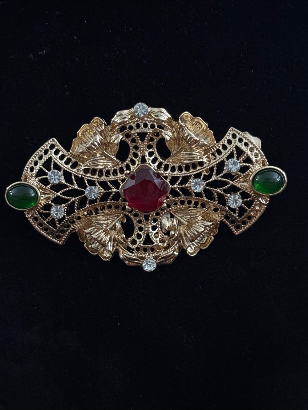 Gold Filigree Brooch with Red and Green cabachons